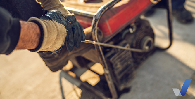 Man starting a portable generator