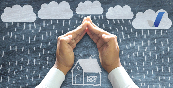 Man protecting his home against severe weather